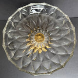 Antique crystal bowl on a bronze stand.