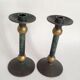 Pair of patinated bronze candlesticks