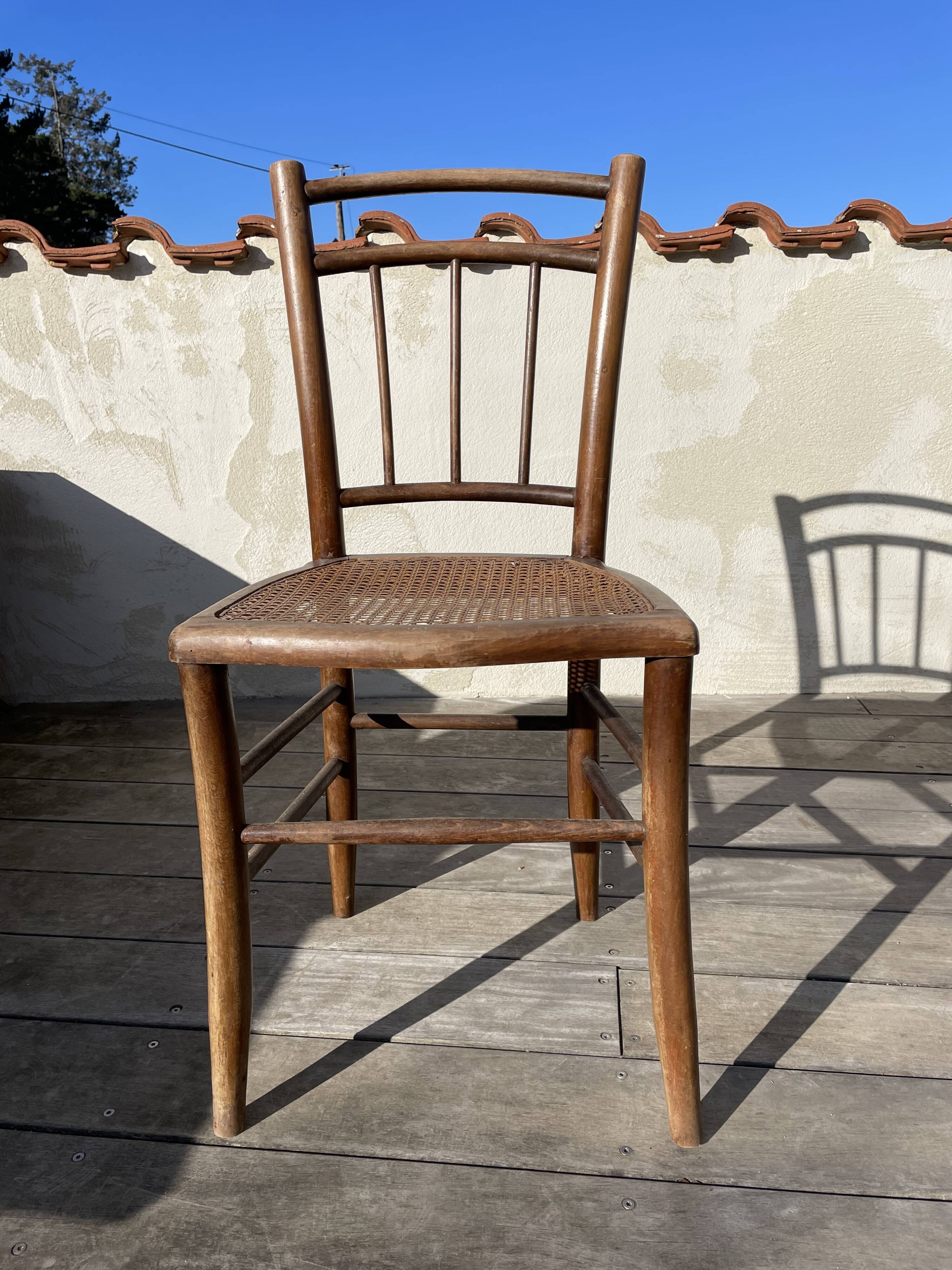 Wooden and cane chair