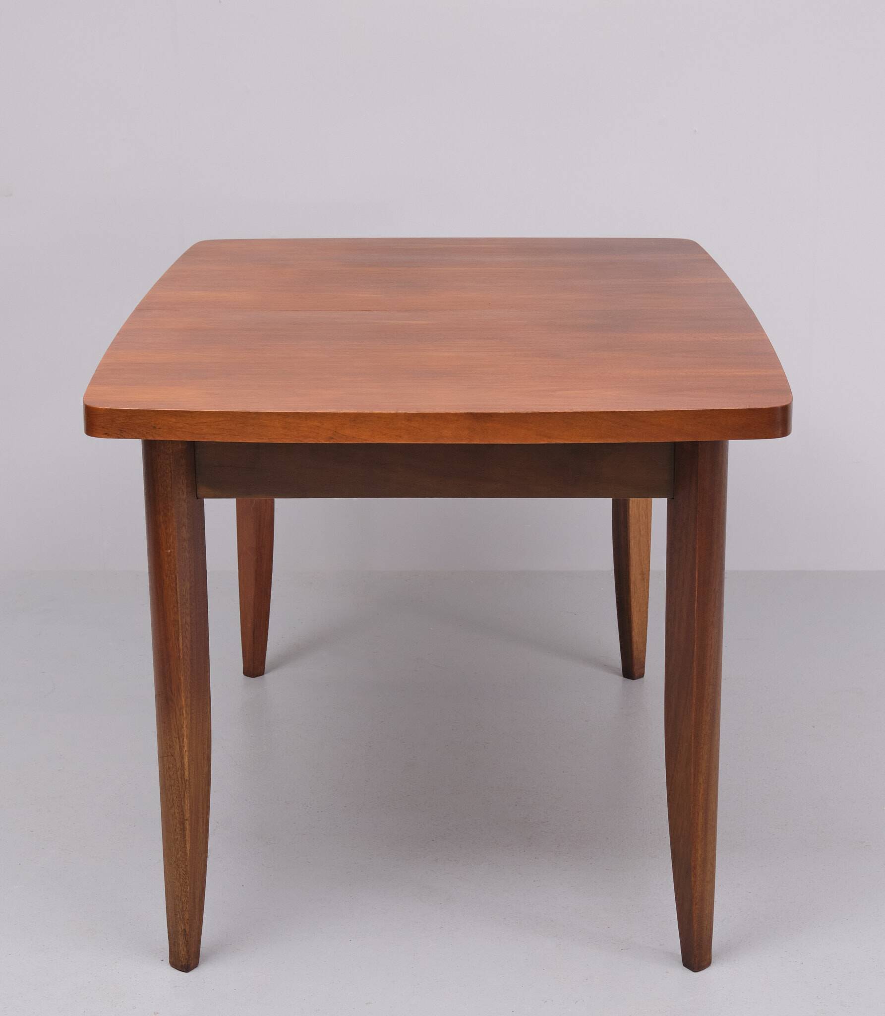 Extendable dining table in walnut wood by Jindrich Halabala 1960