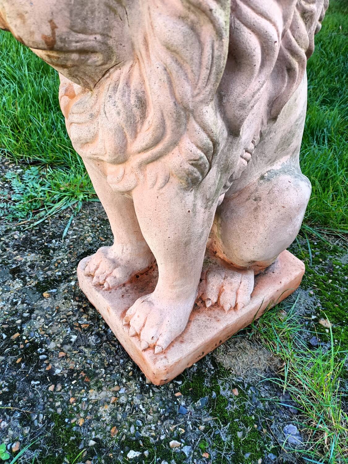 Pair of old terracotta garden lions