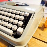 Blue green baby hermes typewriter