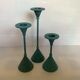 Trio of candlesticks patinated blue green vintage