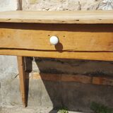 Raw wood farm table with drawer