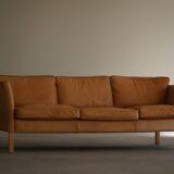 Danish Midcentury 3-seater canapé by Stouby in cognac brown leather, made in the 1970s.