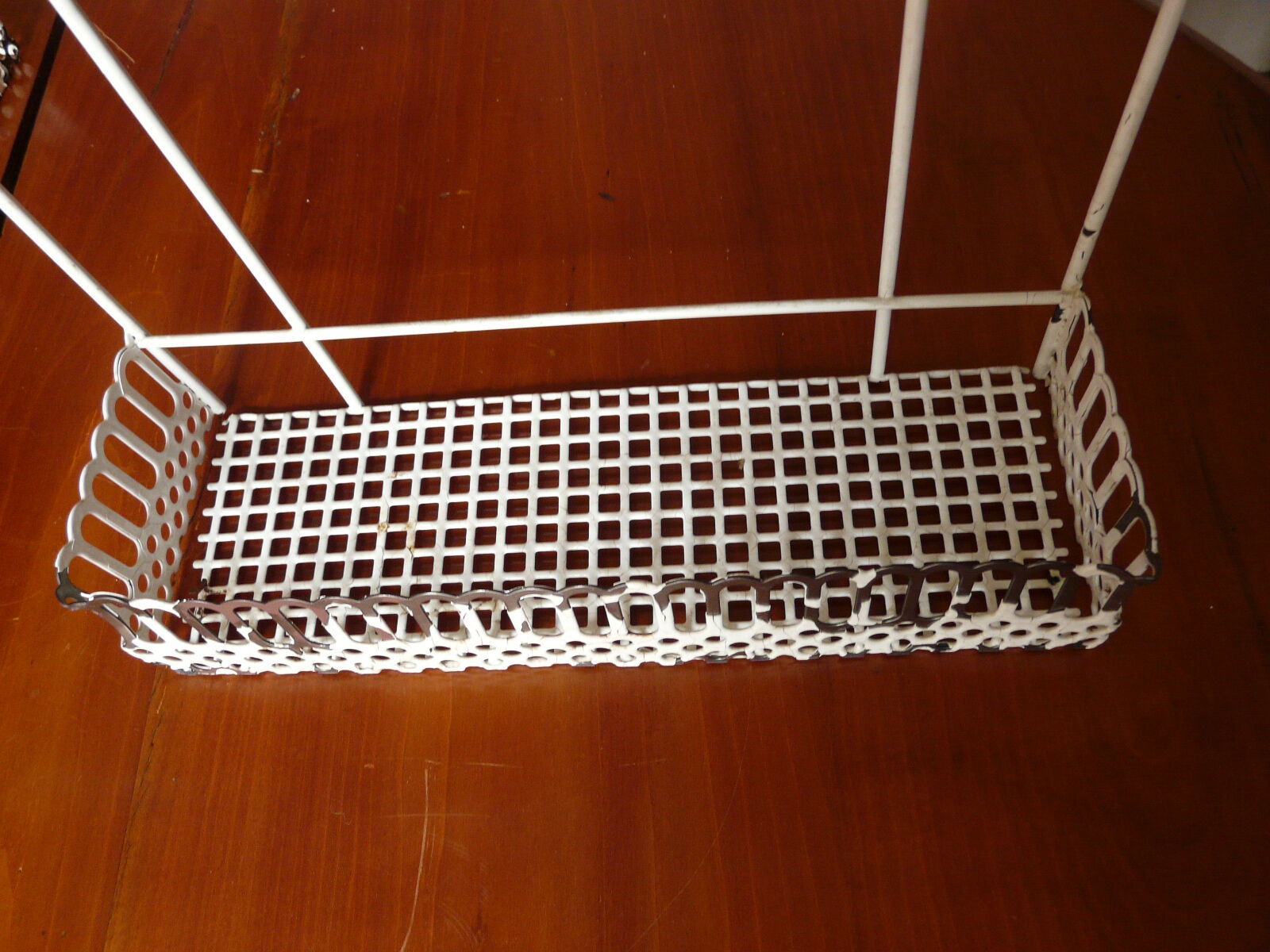 Perforated metal shelf
