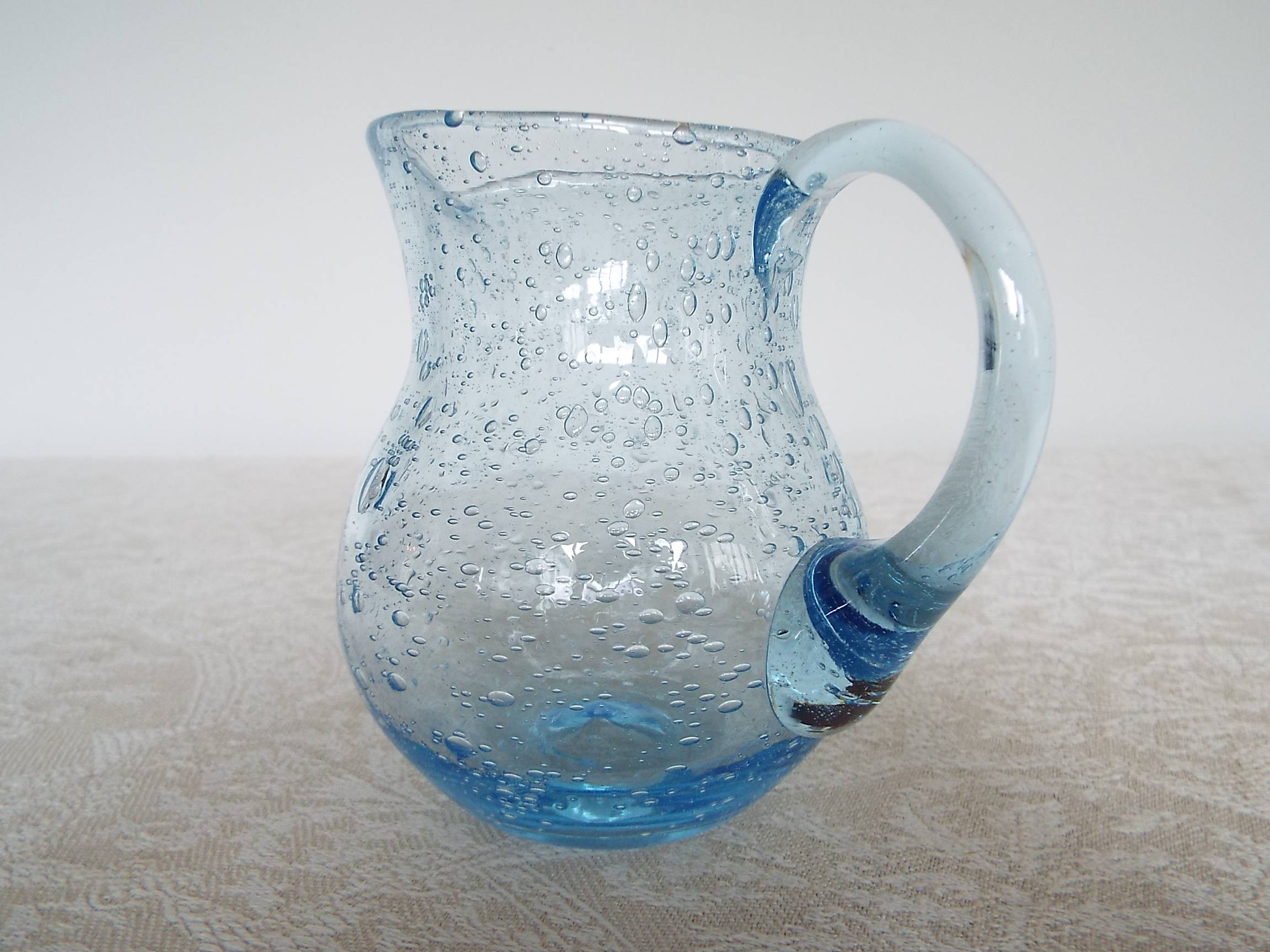 Bulled glass pitcher