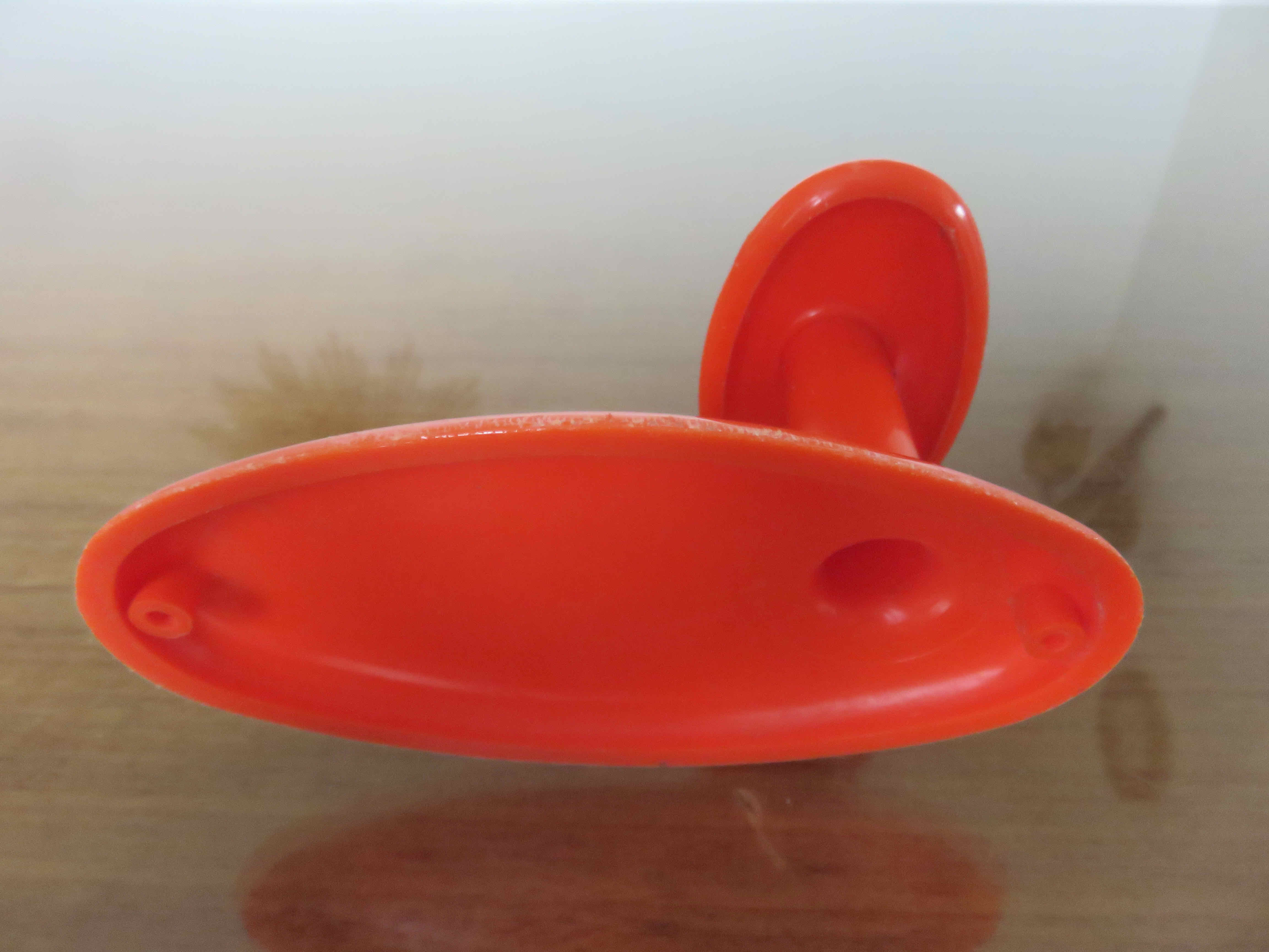 Orange plastic hook 70s