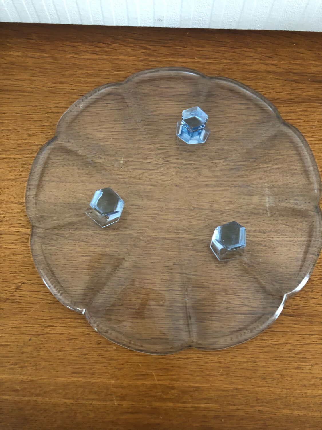 Blue transparent glass pie dish on vintage stand