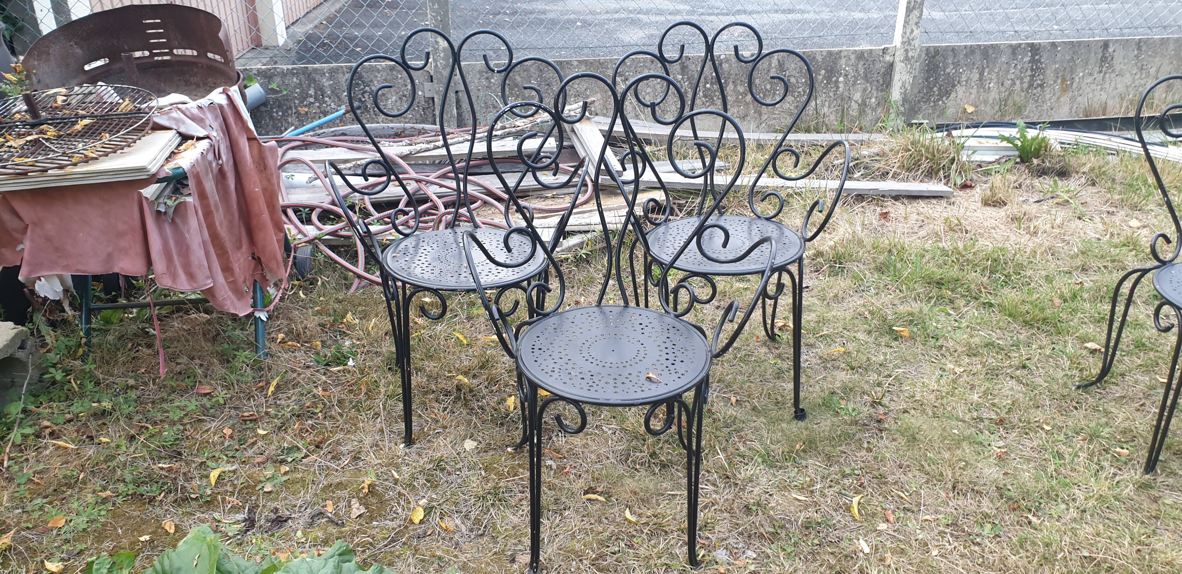 3 ornate wrought iron garden armchairs