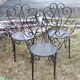 3 ornate wrought iron garden armchairs