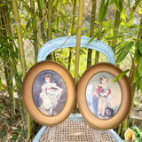 Set of 2 oval paintings