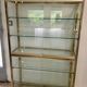 Large exhibition window in gilded brass 20th century period