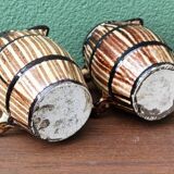 Pair of trompe l'oeil bistro pitchers, barrels