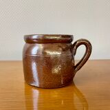 Stoneware pot with glossy glazed brown and vintage speckled gray handle