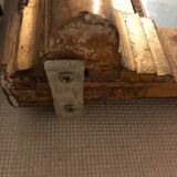 Large antique mirror with flagship shell in wood and gilded stucco