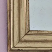 Small Art Deco mirror with a gilded wooden frame.