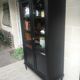 Showcase cabinet of curiosities black and wood