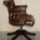 Vintage Chesterfield captain's chair in leather