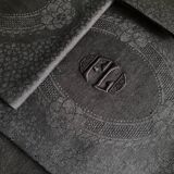 Set of four old damasked towels tinted black