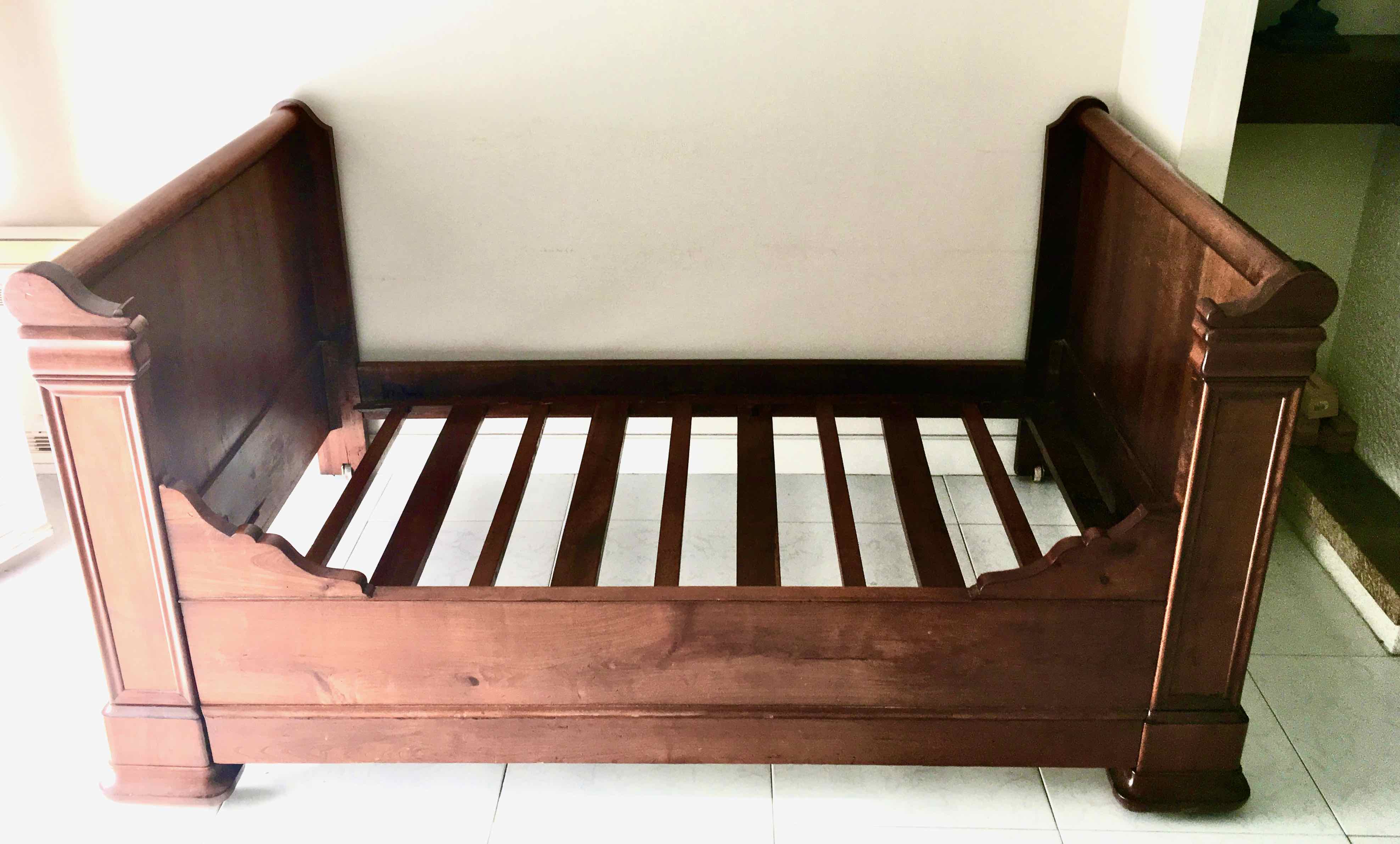 Cherry wood boat bed with bedding