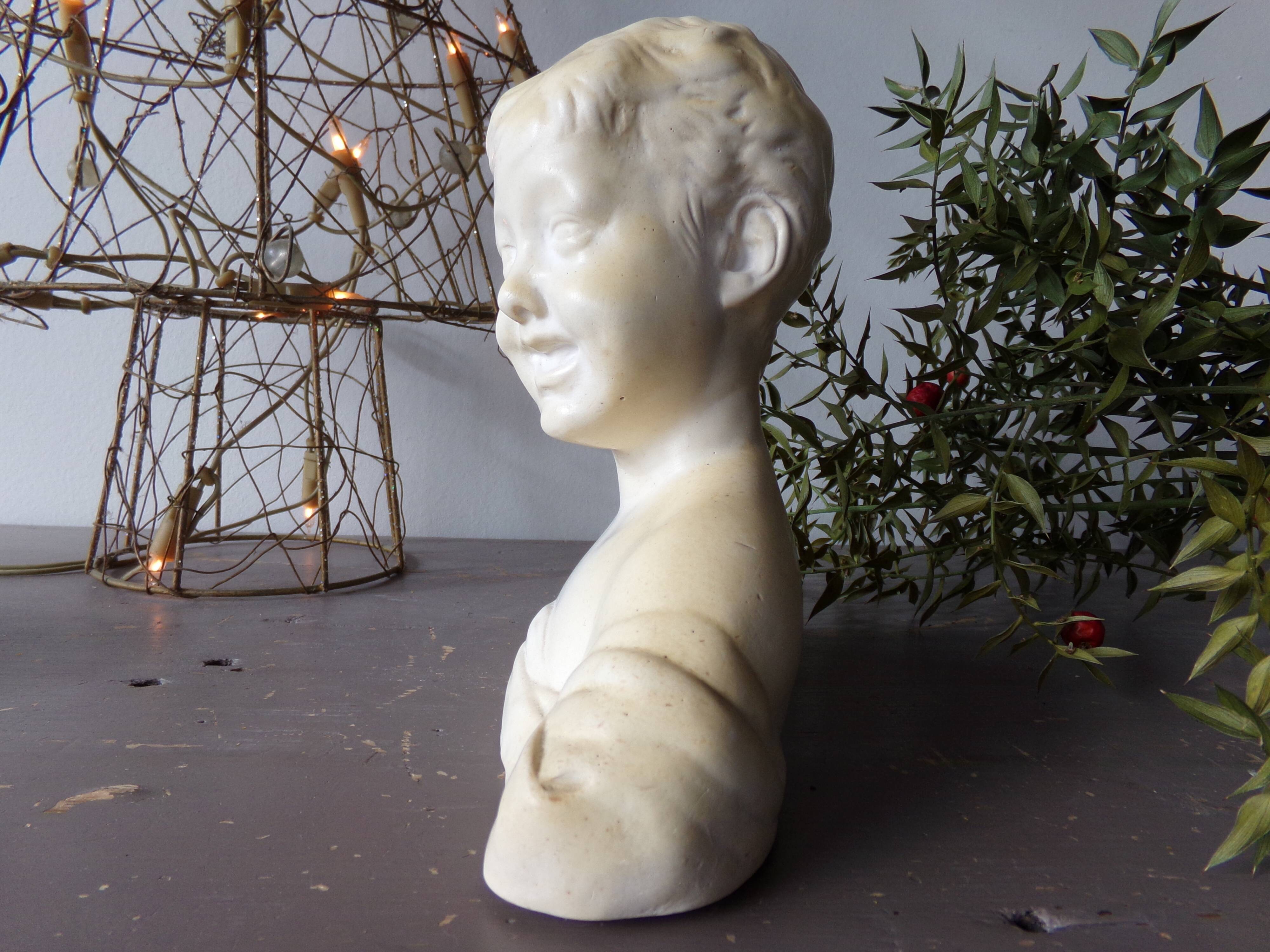 Bust of the laughing child