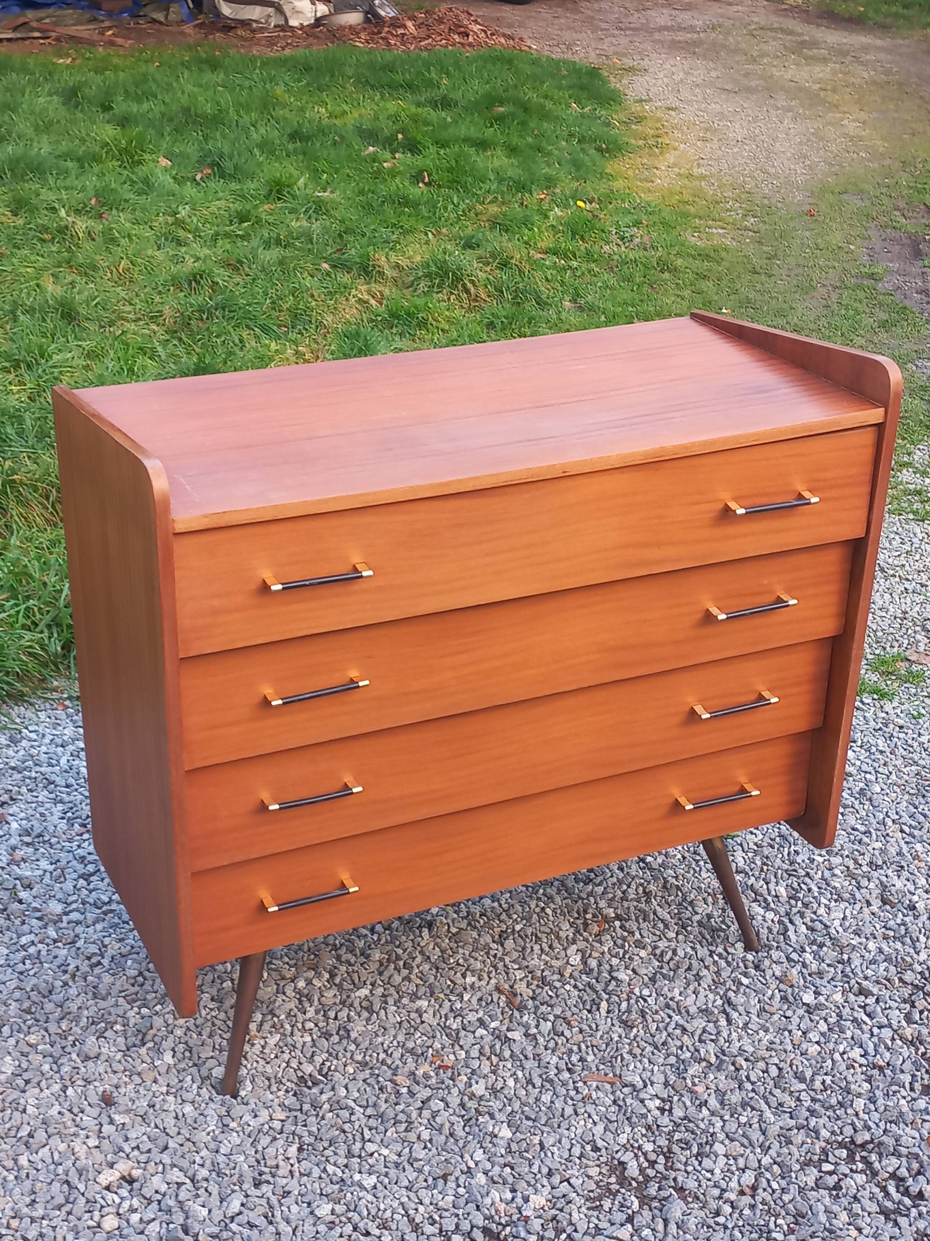 Vintage mahogany commode with metal tapered legs, 4 drawers, 1950s.