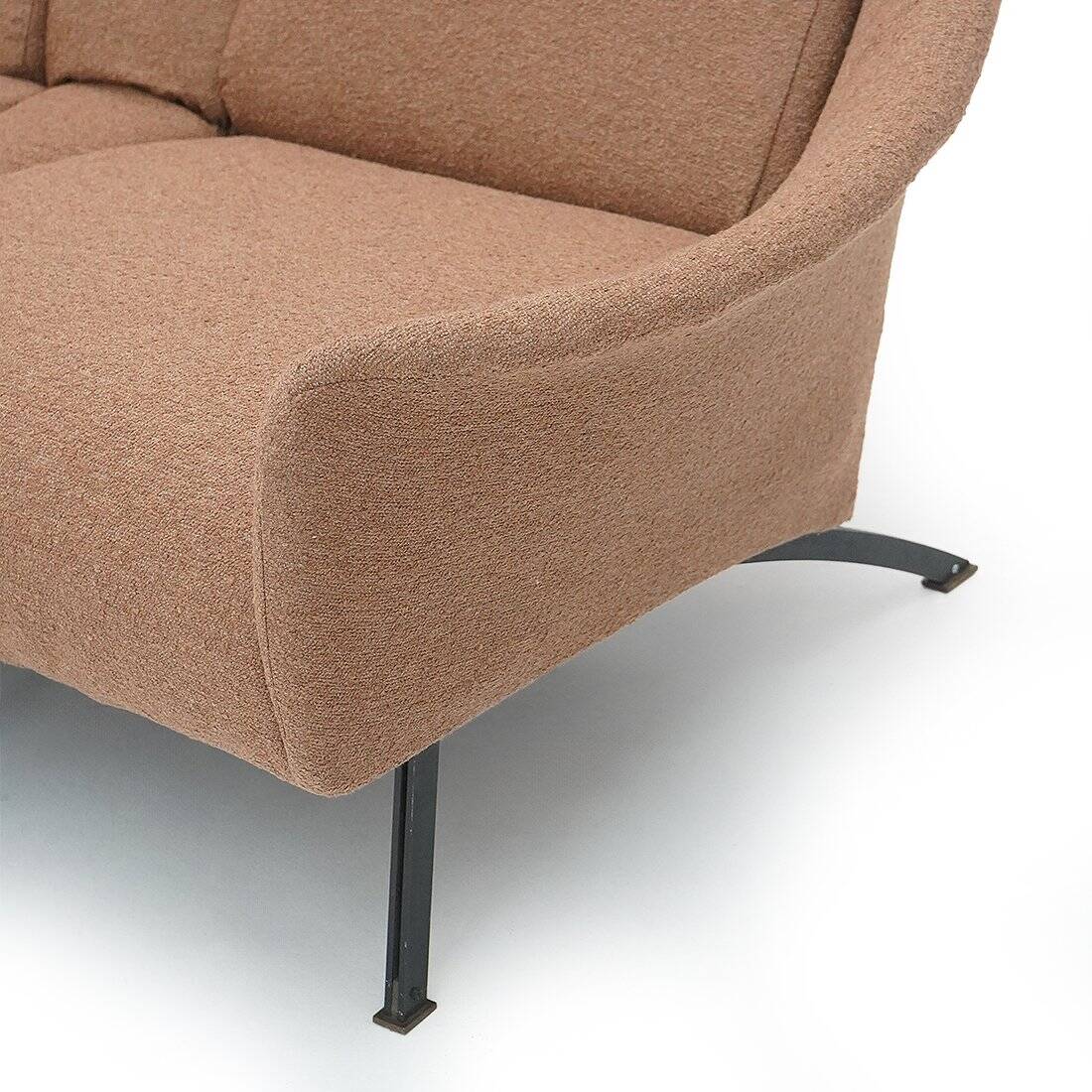 Two-seater canapé in hazelnut boucle, 1950s.