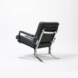 Lounge chair in green leather and chrome, 1970s