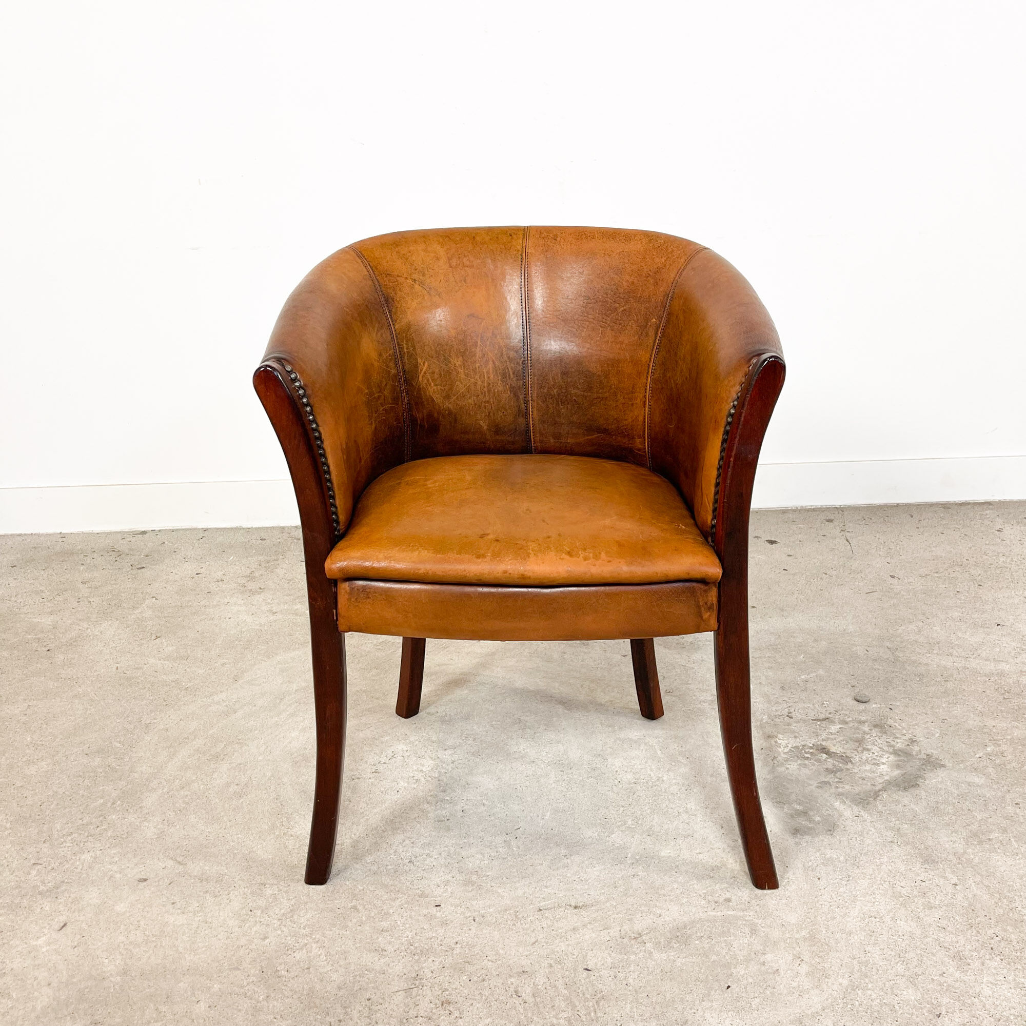 Vintage sheep leather club chair high tub Enschede