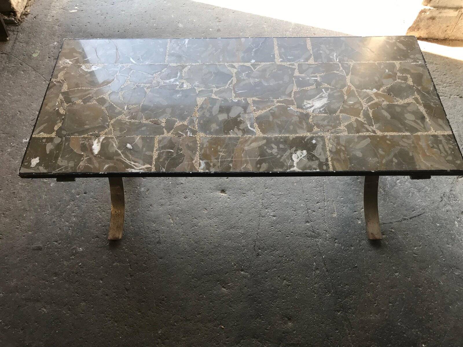Mid-century brown marble coffee table with silver chrome legs from the 1950s.