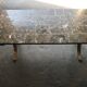 Mid-century brown marble coffee table with silver chrome legs from the 1950s.