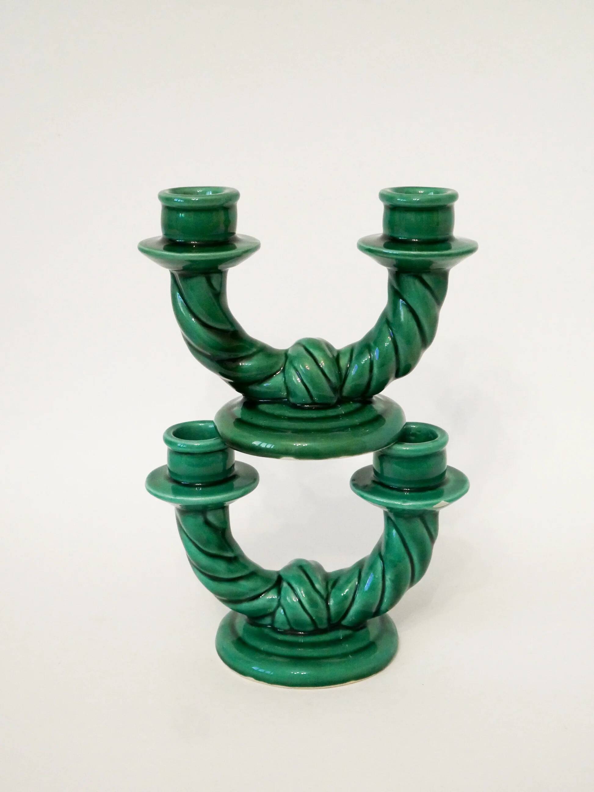 Pair of twisted green ceramic double candlesticks, 1960.