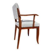 Bridge armchair in stained beech and boucle fabric.