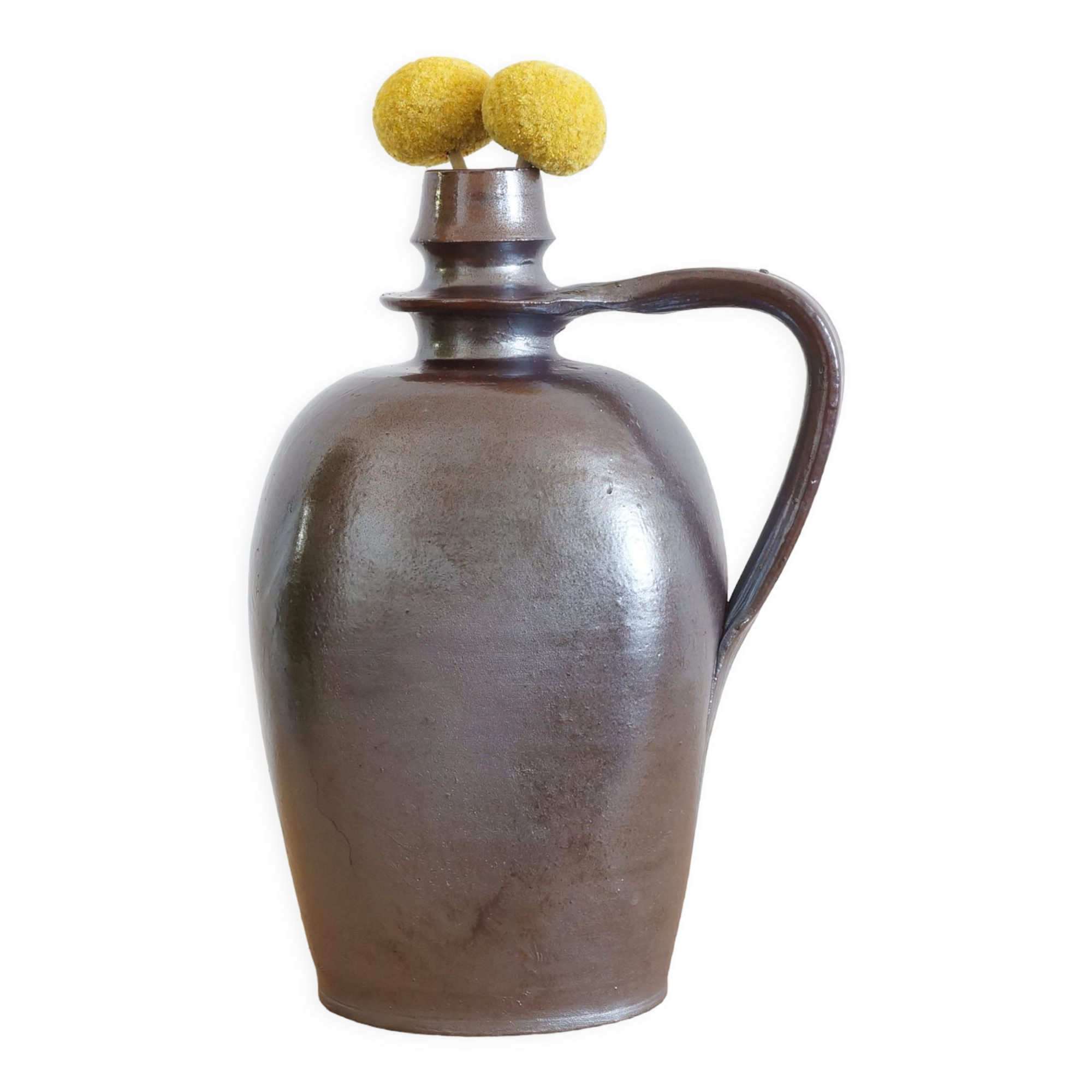 Old Norman bottle in brown ceramic