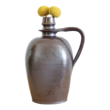 Old Norman bottle in brown ceramic