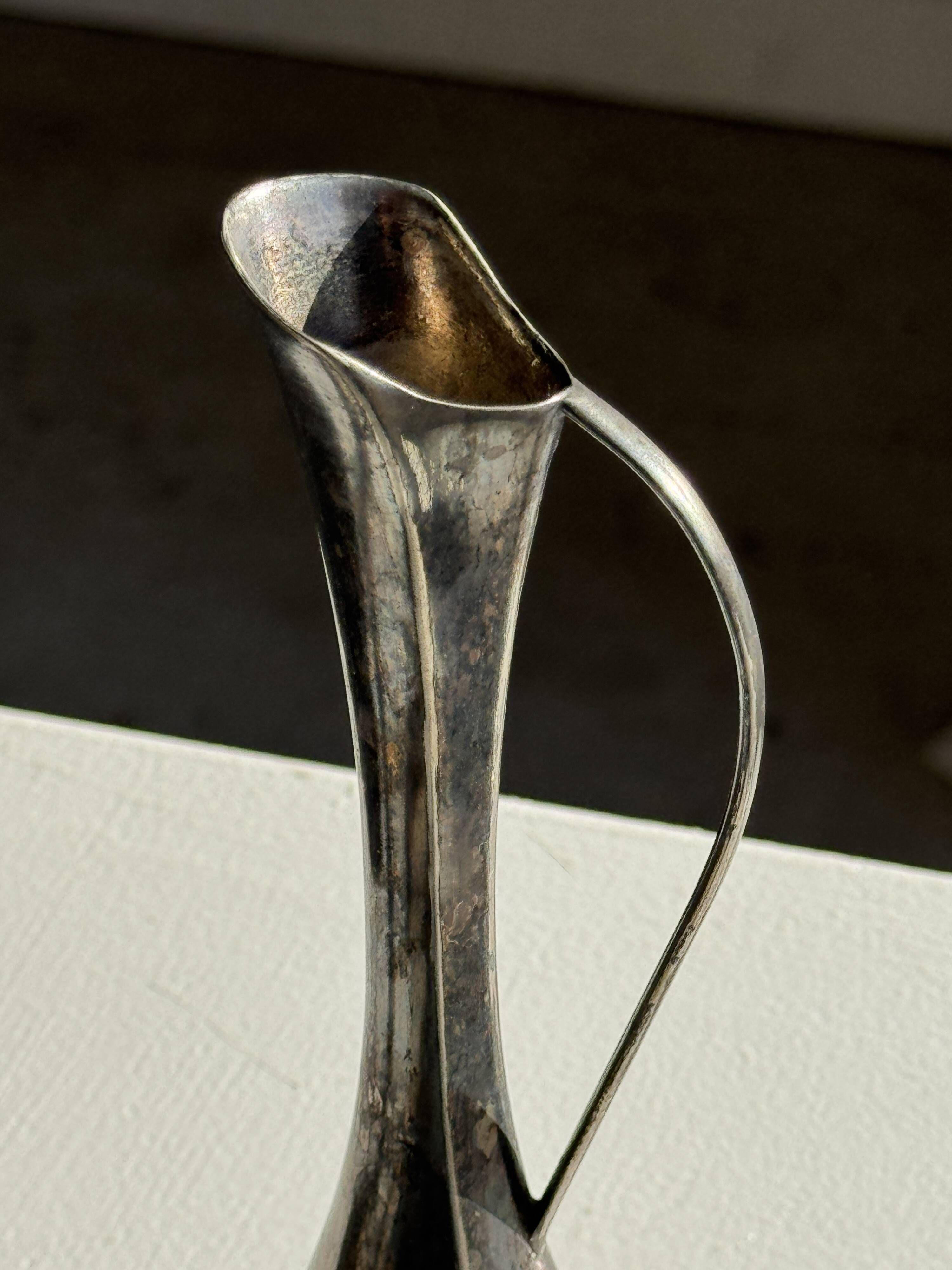 Vintage silver-plated soliflore vase with a dark patina in the shape of a ewer.