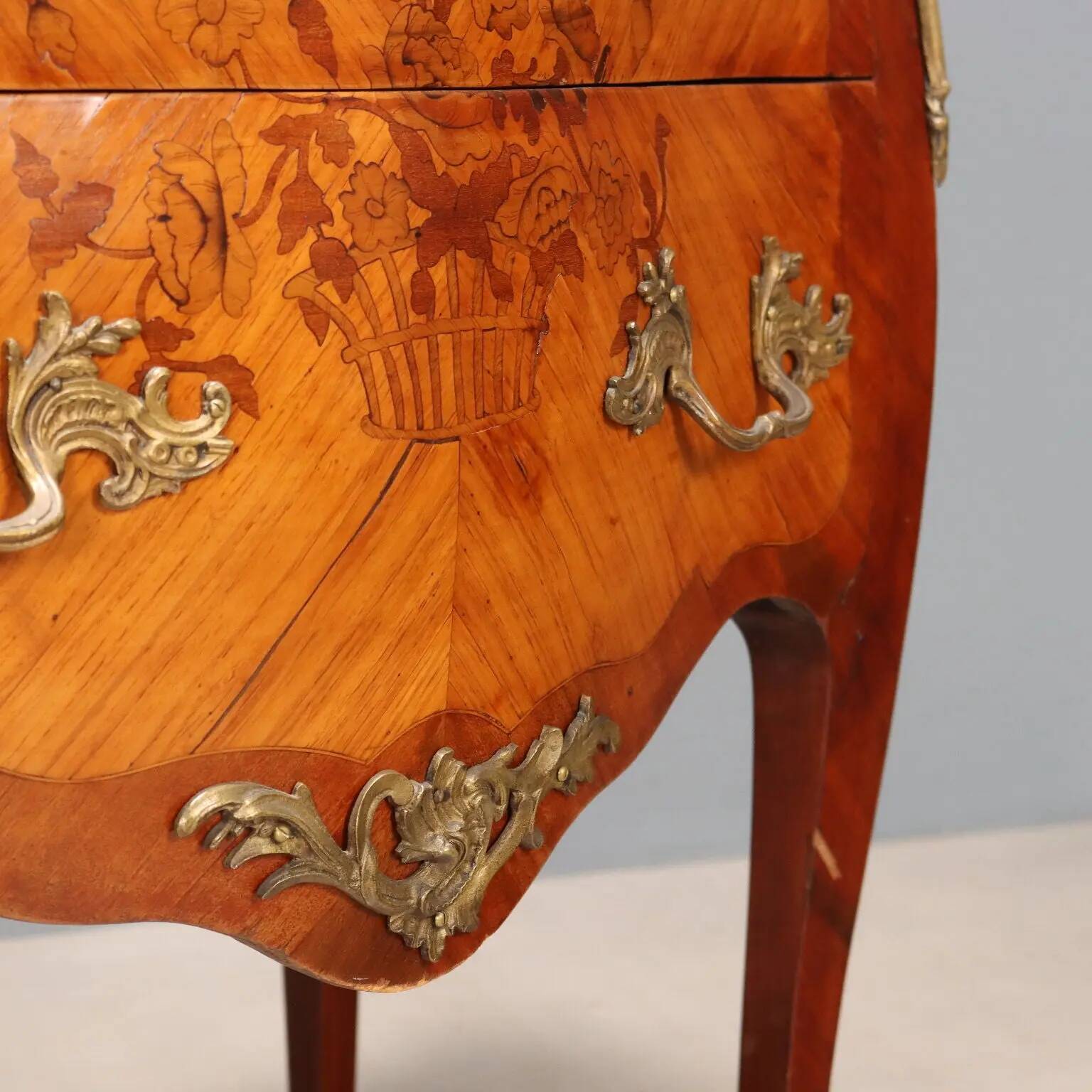 Antique commode in Baroque style made of mahogany, 20th century.