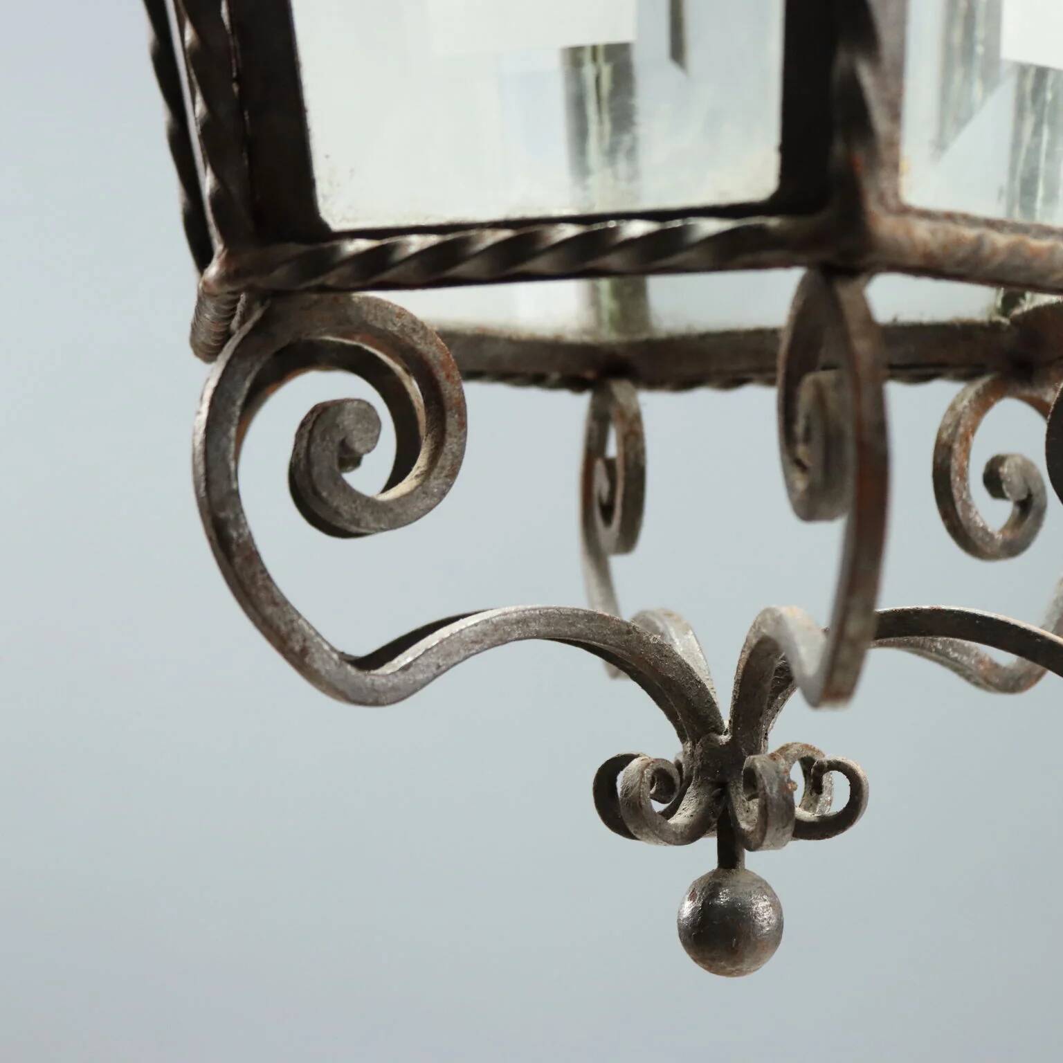 Old iron and glass lanterns, Italy, early 20th century.
