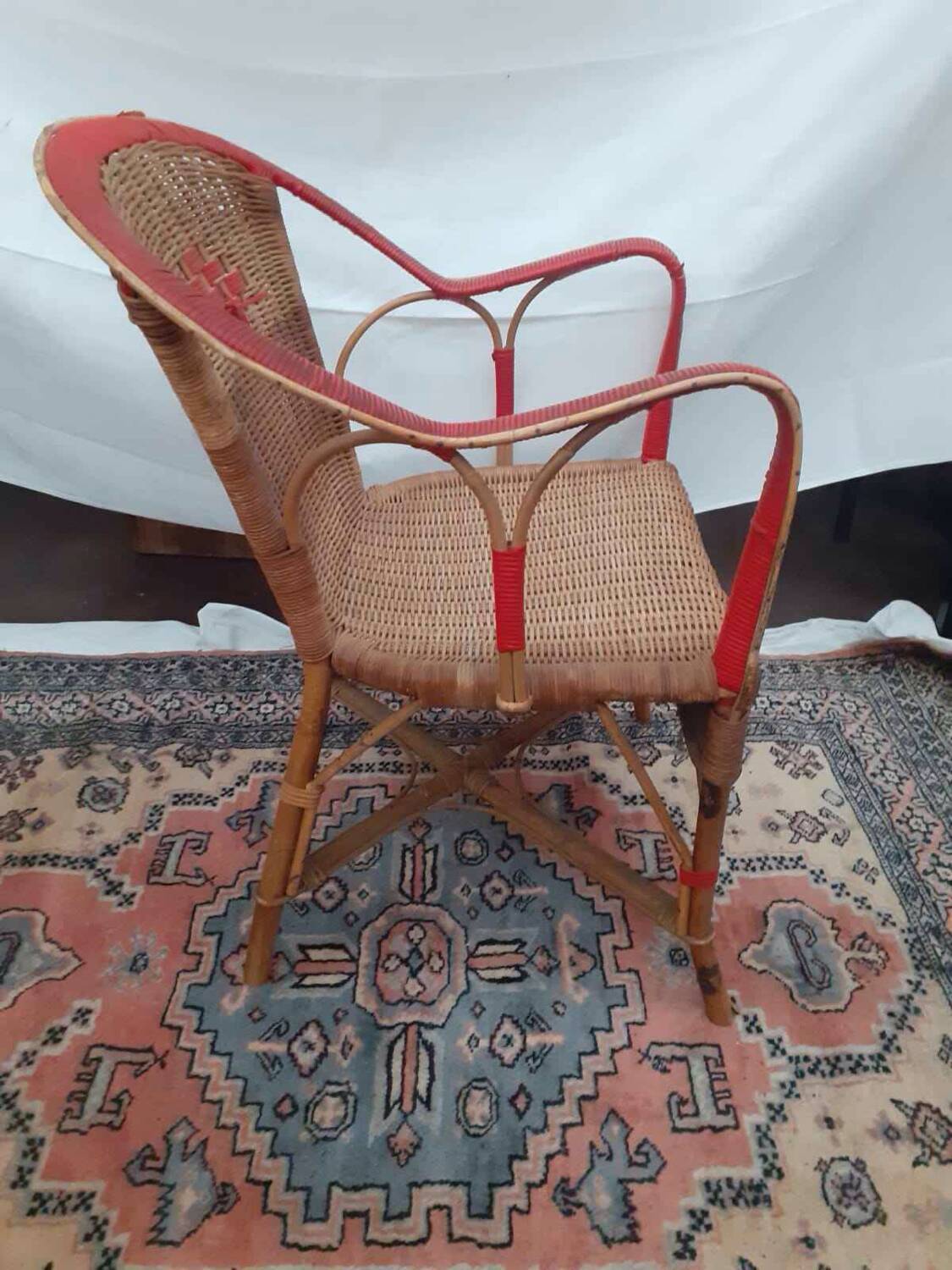 Refurbished wicker armchair