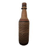 Glass and rattan bottle