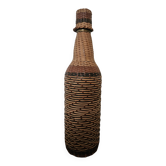 Glass and rattan bottle