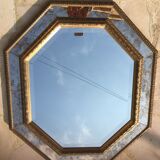 Antique mirror in gilded wood with beveled octagonal shape 72 x 63 cm