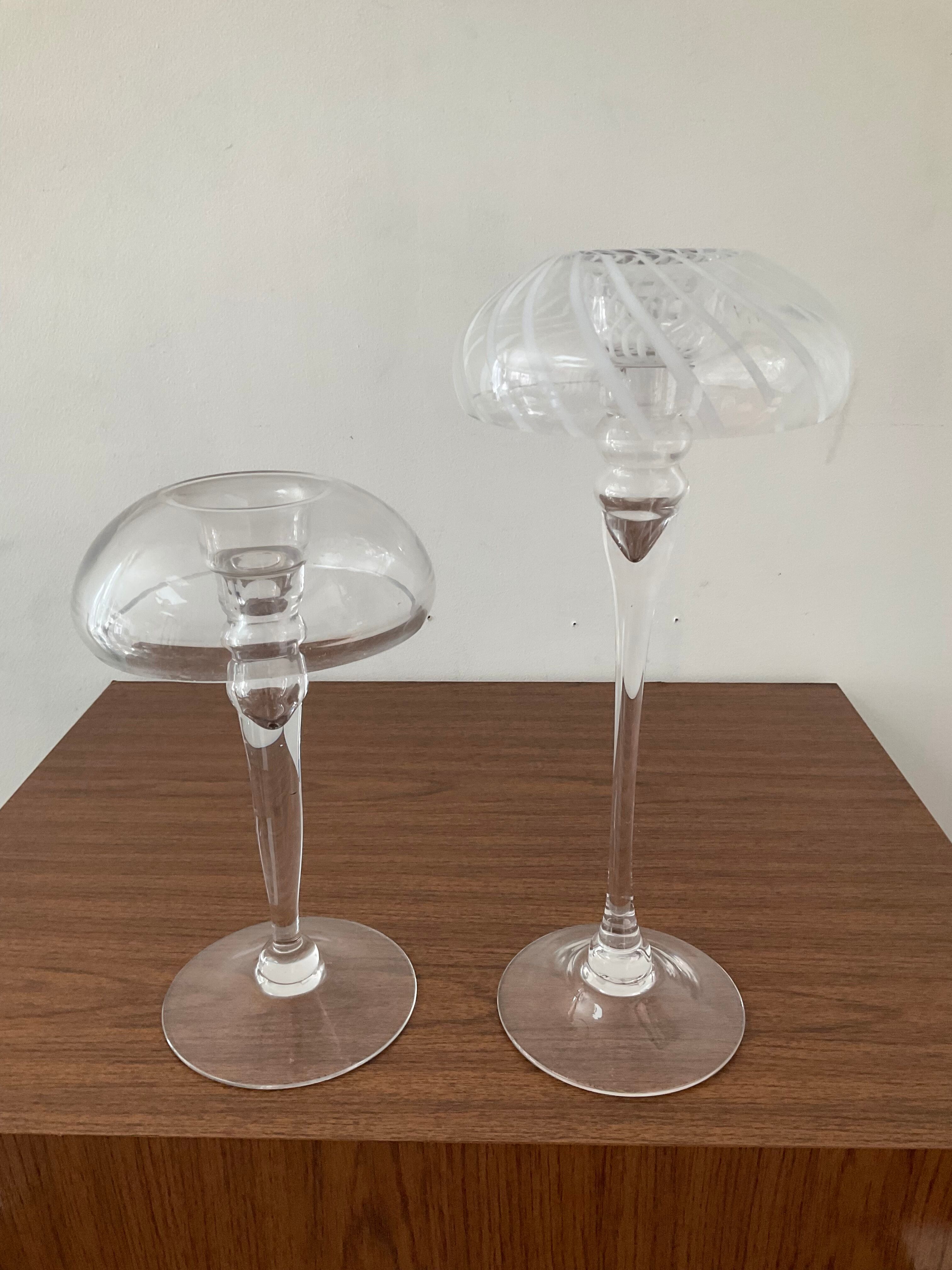 Pair of candle holders in glass paste