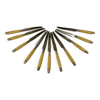 11 Art Deco knives, Bakelite and silver plated in a box