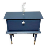 Old bedside table with compass feet