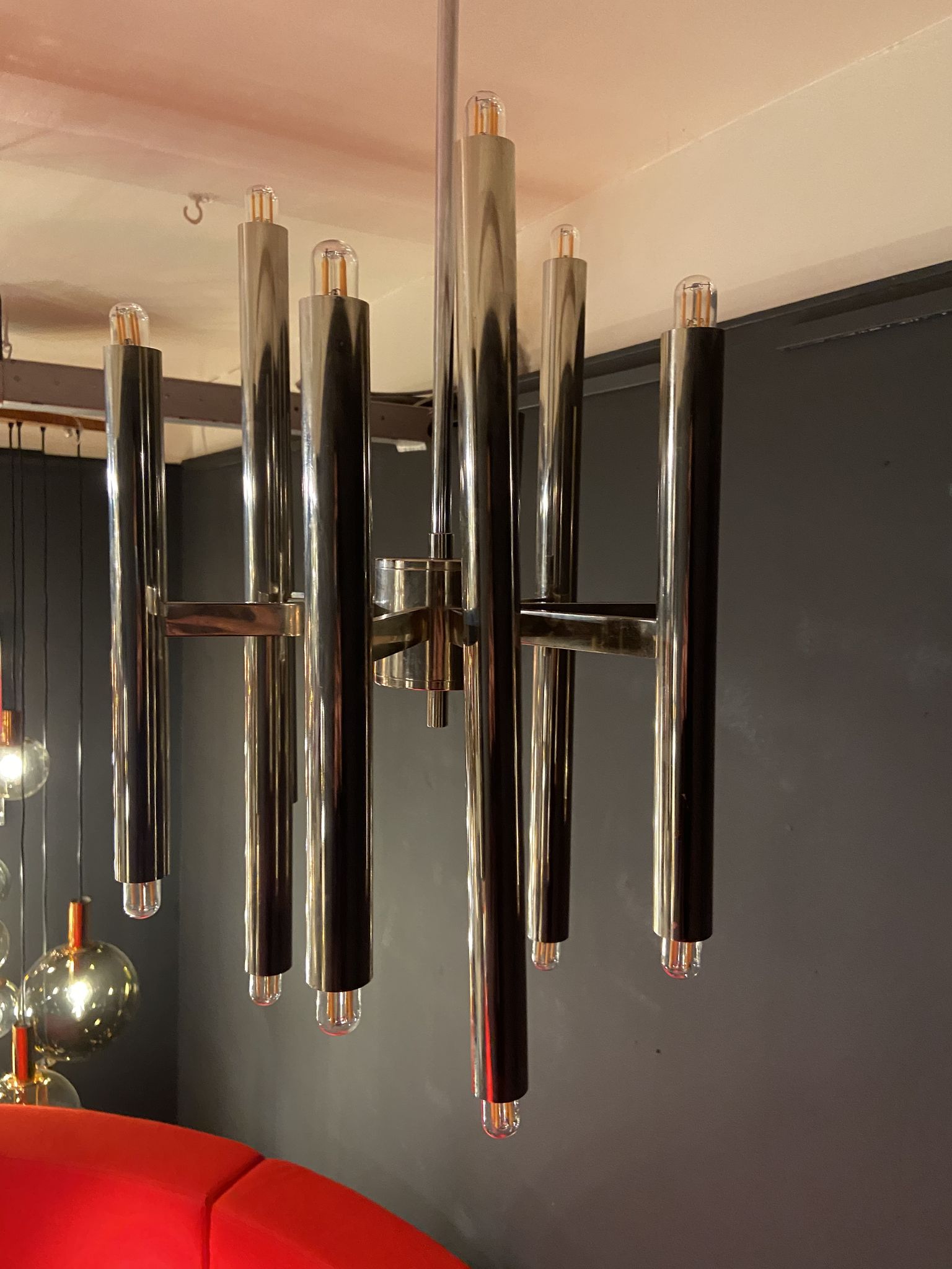 Scoliari chandelier with 18 bright nickel dots distributed by Boulanger