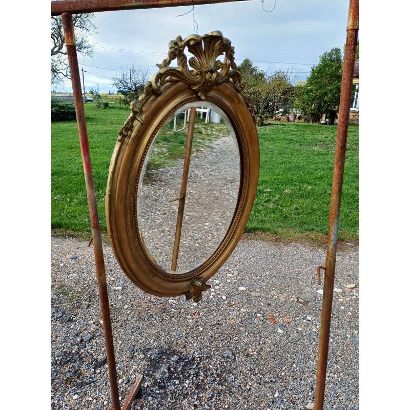 Miroir ovale en bois et stuc doré 19ème