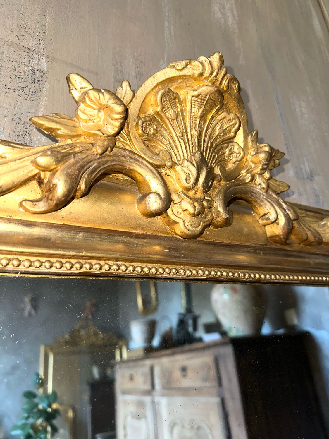 Antique gilded Louis-Philippe mirror, 19th century.