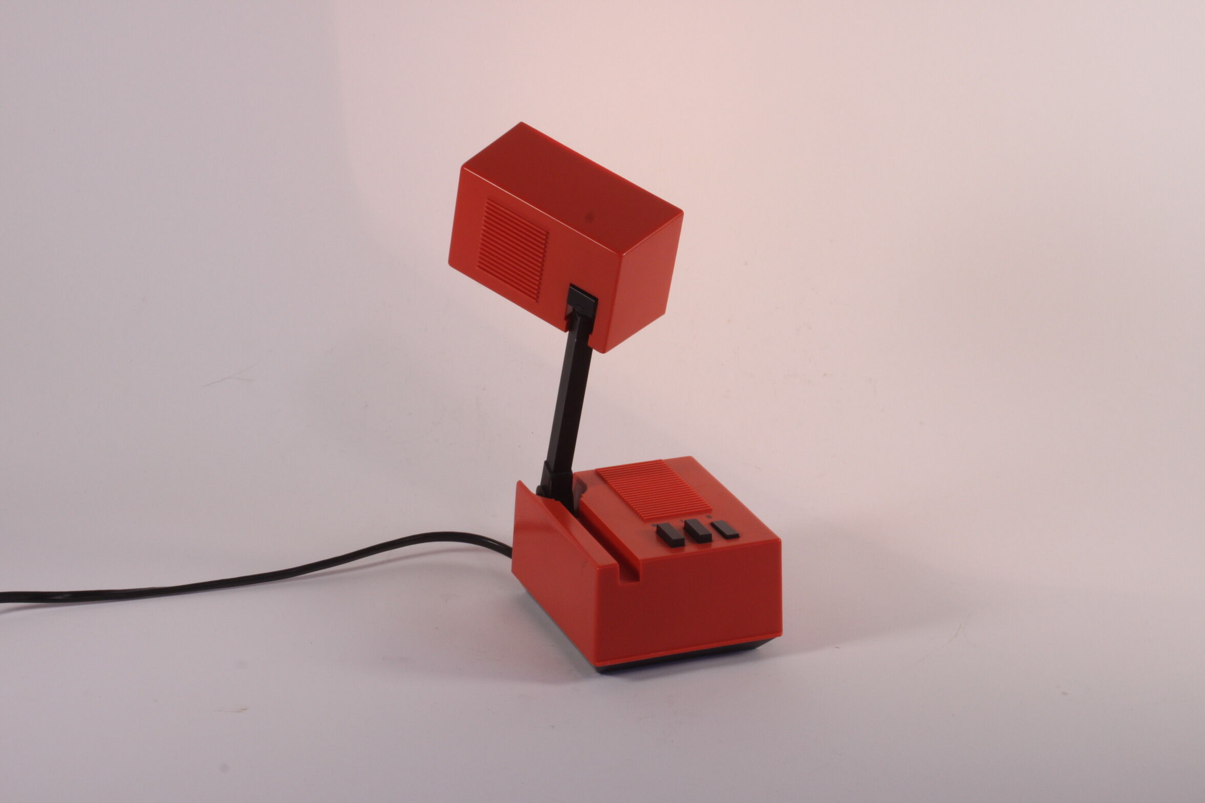 Lampe de lecture compacte rouge par Staff Leuchten, Allemagne années 1960.